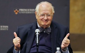 Angus Deaton gestures at a gathering at Princeton University after it was announced that he won the Nobel prize in economics for improving understanding of poverty and how people in poor countries respond to changes in economic policy, Monday, Oct. 12, 2015, in Princeton, N.J. Deaton, 69, won the 8 million Swedish kronor (about $975,000) prize from the Royal Swedish Academy of Sciences for work that the award committee said has had "immense importance for human welfare, not least in poor countries." (AP Photo/Mel Evans)
