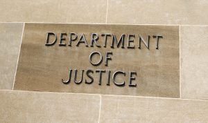 Sign on Department of Justice building, Washington, DC